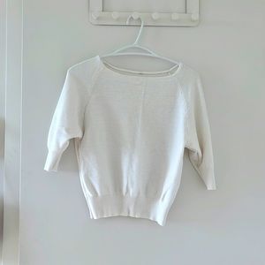 White top with mid length sleeves